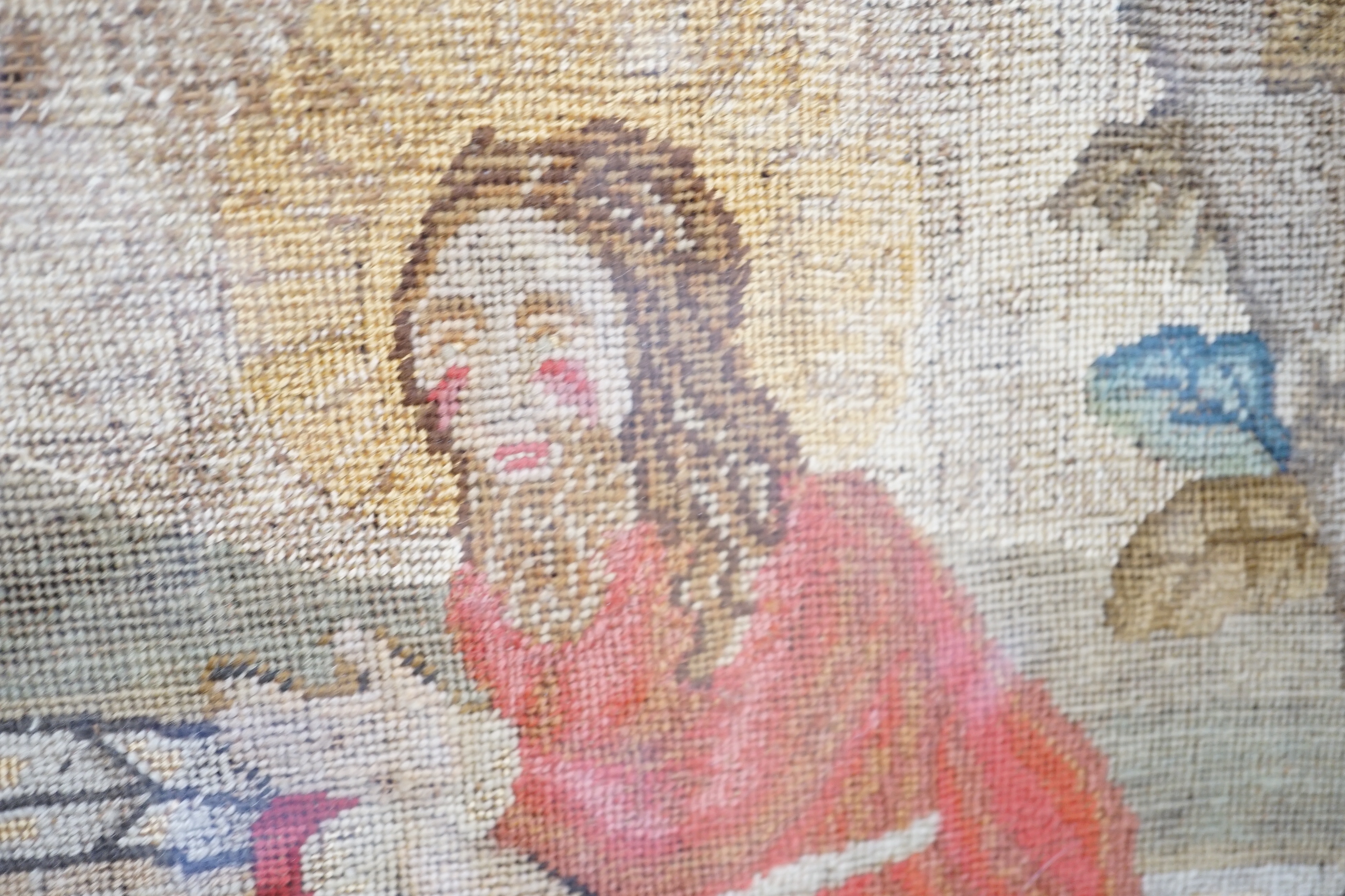 An early Victorian woolwork picture of Christ and the Samaritan widow at the well, 71x65cm, in rosewood frame